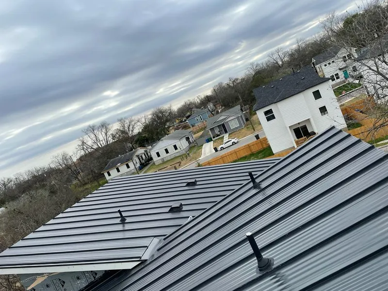 Standing seam metal roof panels with vents for Skylight Repair in Oakfield